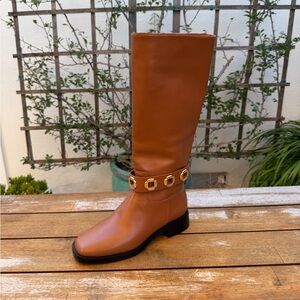 LARROUDE knee high boots.